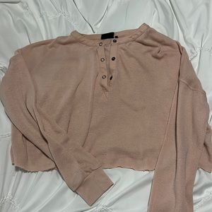 Out front under long sleeve crop top